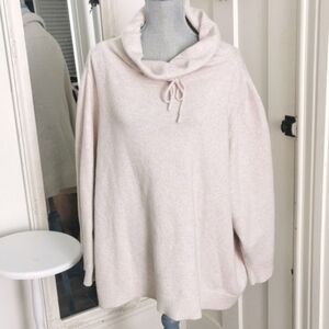 In every story.... cream athletic cowl neck sweater. Size 5XL